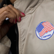 A voter shows off her “I Voted” sticker as she leaves a polling place Nov. 4, 2014, in Ferguson, Mo.
Scott Olson/Getty Images
